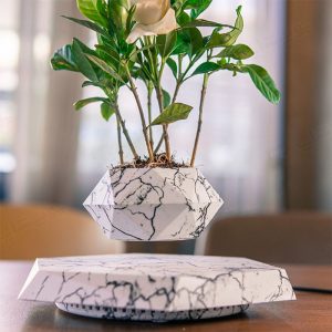گلدان معلق مغناطیسی طرح سنگ مرمر FLOATING BONSAI POT مناسب برای انواع دکوراسیون ها می باشد.