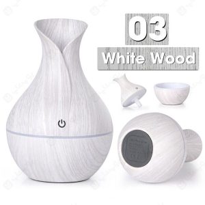 دستگاه بخور ساز و خوشبو کننده التراسونیک مدل Aroma Diffuser Humidifier با طرح چوب می باشد.